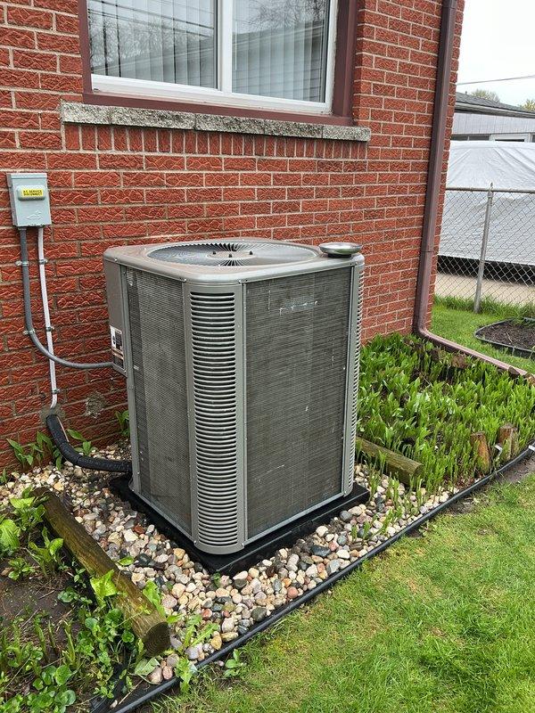 Completed annual preventive maintenance on residential air conditioning condenser unit. Performed comprehensive system inspection including visual assessment of cabinet condition, electrical connections, refrigerant lines, and condensate drainage. Unit showed signs of age with exterior weathering and dirt accumulation but was operating within normal parameters. Verified proper fan motor operation, checked electrical disconnect functionality, and confirmed adequate clearance around unit for airflow.