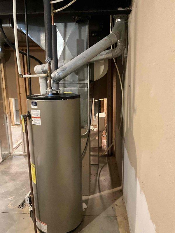 Conducted comprehensive assessment of existing HVAC system in recently purchased residence. Evaluated 16-year-old furnace unit and aging air conditioning system located in basement utility area, documented equipment condition through photographic documentation, and provided full system replacement estimate. Reviewed current installation configuration including PVC venting, ductwork connections, and overall mechanical room layout to develop replacement recommendations for homeowner seeking installation within the next couple weeks.