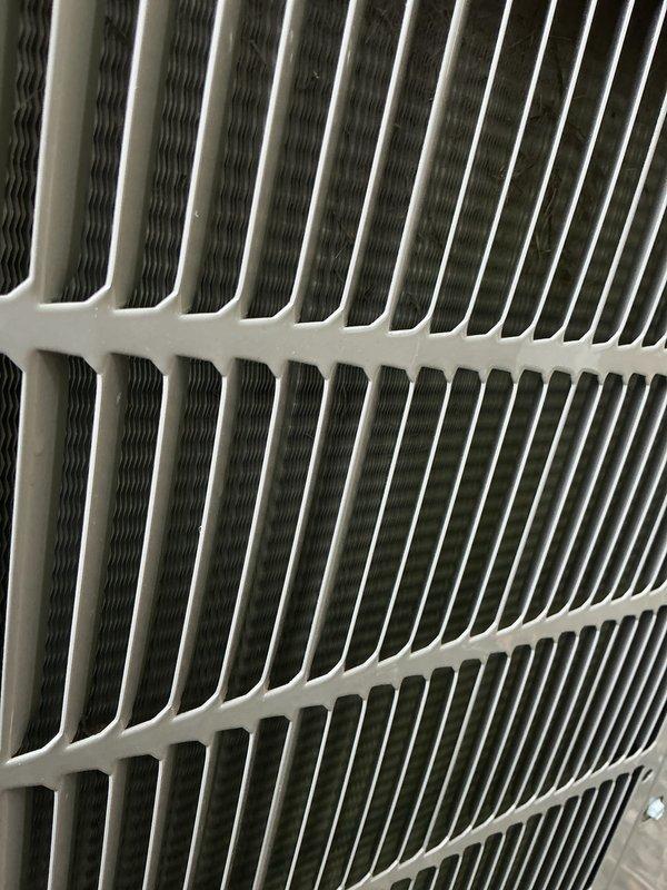 Completed routine annual cooling maintenance on residential air conditioning system. Performed comprehensive inspection of outdoor condenser unit, including examination of heat exchanger coil fins which were found to be clean and in good condition with no debris accumulation, corrosion, or damage. Documented unit condition with photographs showing proper fin spacing and structural integrity of coil assembly. System operational and ready for cooling season.