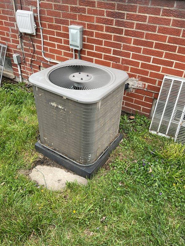Completed routine air conditioning maintenance on residential condenser unit. Performed standard inspection of outdoor unit, verified operational status of all components, and documented equipment condition with photos. Unit found in serviceable condition with normal weathering consistent with outdoor installation.