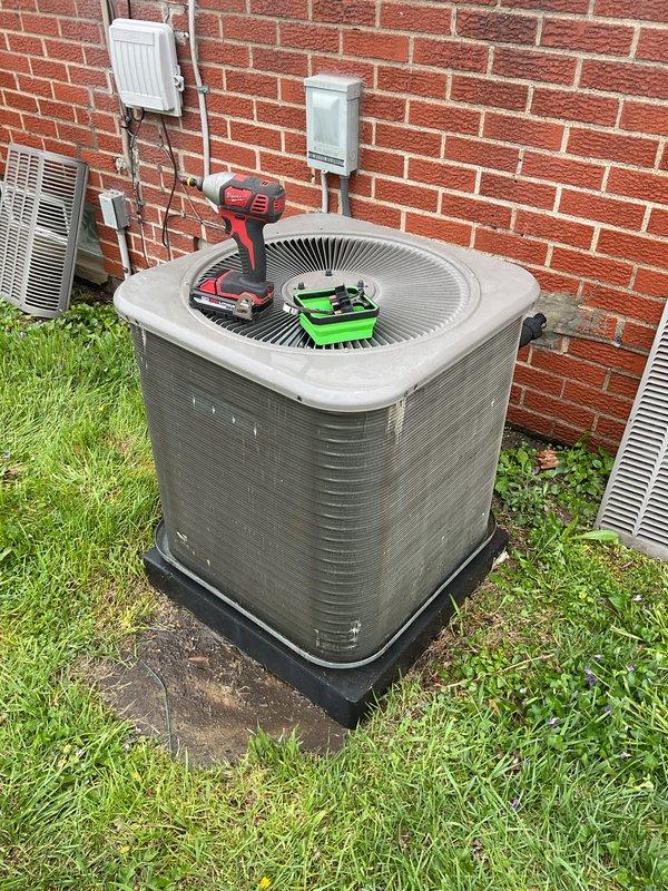 Completed routine air conditioning maintenance on residential condenser unit. Performed standard inspection of outdoor unit, verified operational status of all components, and documented equipment condition with photos. Unit found in serviceable condition with normal weathering consistent with outdoor installation.