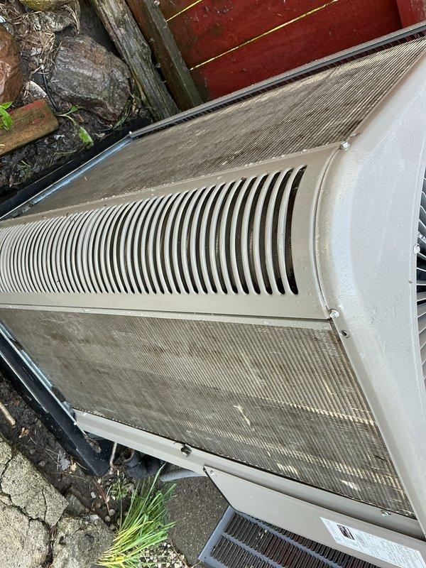 Completed scheduled air conditioning maintenance on outdoor condensing unit. Performed system inspection, documented equipment condition including exterior housing and ventilation components, and verified proper installation on concrete pad. Unit operational with no immediate service needs identified during routine maintenance visit.