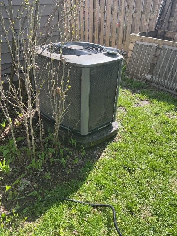 Completed annual cooling maintenance on residential split system air conditioning unit. Performed comprehensive inspection of outdoor condenser unit including visual assessment of cabinet condition, refrigerant lines, electrical connections, and fan operation. Cleaned condenser coils, checked refrigerant levels, verified proper airflow, and ensured adequate clearance around unit for optimal performance. System operating within normal parameters upon completion of maintenance service.