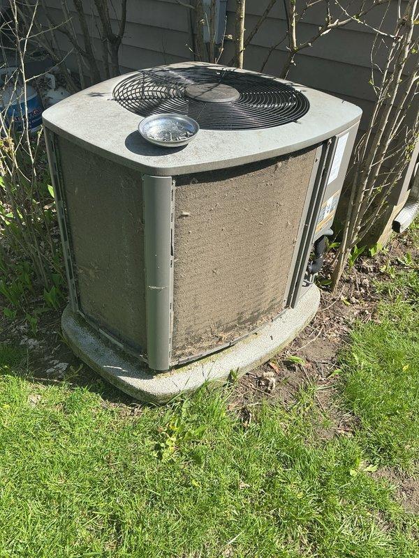 Completed annual cooling maintenance on residential split system air conditioning unit. Performed comprehensive inspection of outdoor condenser unit including visual assessment of cabinet condition, refrigerant lines, electrical connections, and fan operation. Cleaned condenser coils, checked refrigerant levels, verified proper airflow, and ensured adequate clearance around unit for optimal performance. System operating within normal parameters upon completion of maintenance service.