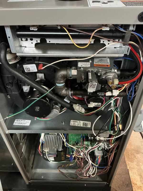 Completed scheduled preventative maintenance on residential HVAC system including both heating and cooling components. Performed comprehensive inspection of furnace interior, gas valve assembly, heat exchanger, blower motor, control board, and all electrical connections. Verified proper operation of safety controls, checked refrigerant lines for wear, confirmed wiring integrity throughout system, and documented equipment condition with interior photographs for maintenance records.