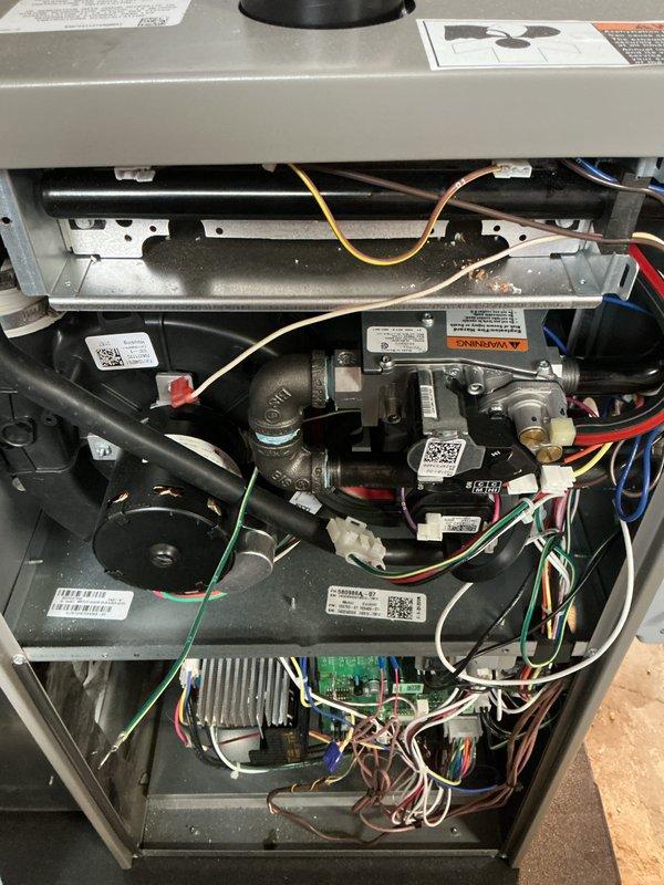 Completed scheduled preventative maintenance on residential HVAC system including both heating and cooling components. Performed comprehensive inspection of furnace interior, gas valve assembly, heat exchanger, blower motor, control board, and all electrical connections. Verified proper operation of safety controls, checked refrigerant lines for wear, confirmed wiring integrity throughout system, and documented equipment condition with interior photographs for maintenance records.