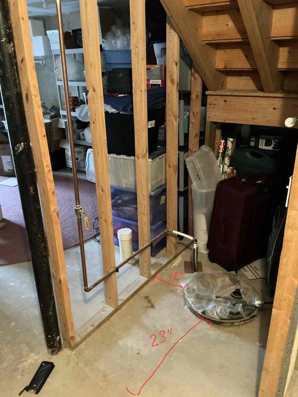 Conducted on-site assessment for water heater and water softener replacement in residential property. Evaluated existing water heater installation in utility closet, documenting current configuration with PVC and metal supply lines, gas connections, and electrical components. Inspected unfinished basement area with exposed framing and measured available space for new equipment installation, noting existing copper plumbing infrastructure and concrete floor preparation requirements. Photographed current installations and provided comprehensive estimate for replacement of both water heater and water softener systems.