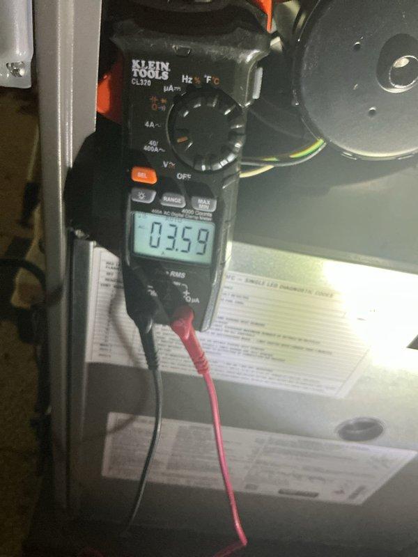 Completed scheduled ComfortGuard Maintenance visit including filter replacement and system inspection. Verified thermostat operation with proper temperature display and programming functionality, and performed electrical diagnostics confirming system voltage readings within manufacturer specifications at 369 volts.