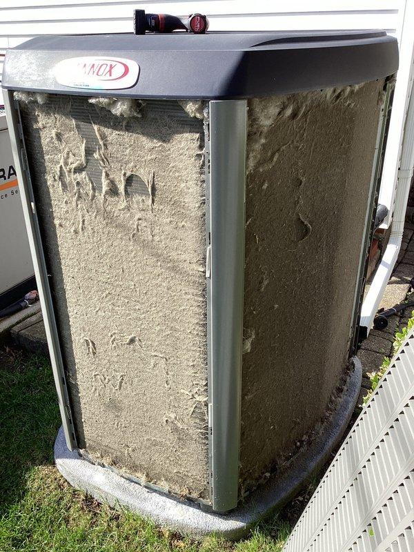 Completed annual cooling maintenance on Lennox air conditioning condenser unit. Performed thorough cleaning of exterior coils which had accumulated significant dirt, dust, and debris buildup. Replaced air filter and evaporator pad as part of routine ACM service, ensuring optimal system performance and airflow for the cooling season.