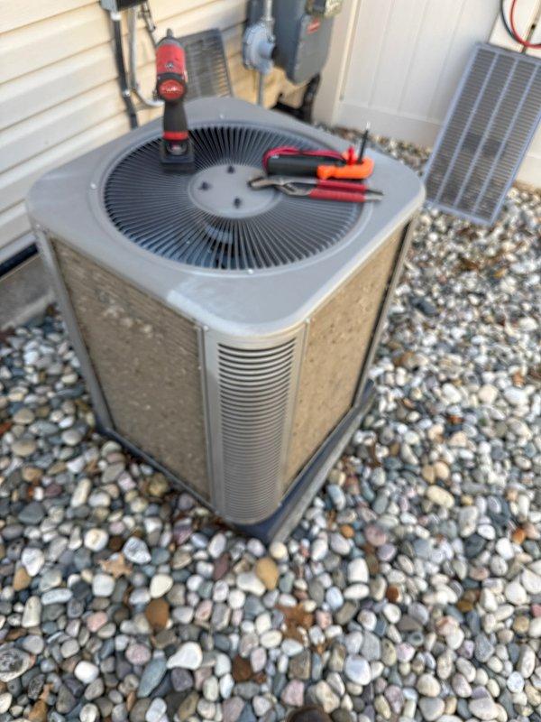 Completed routine air conditioning maintenance on residential condensing unit. Replaced air filter and evaporator pad, performed system inspection, and verified proper operation of all components.