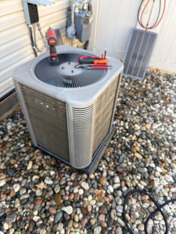 Completed routine air conditioning maintenance on residential condensing unit. Replaced air filter and evaporator pad, performed system inspection, and verified proper operation of all components.