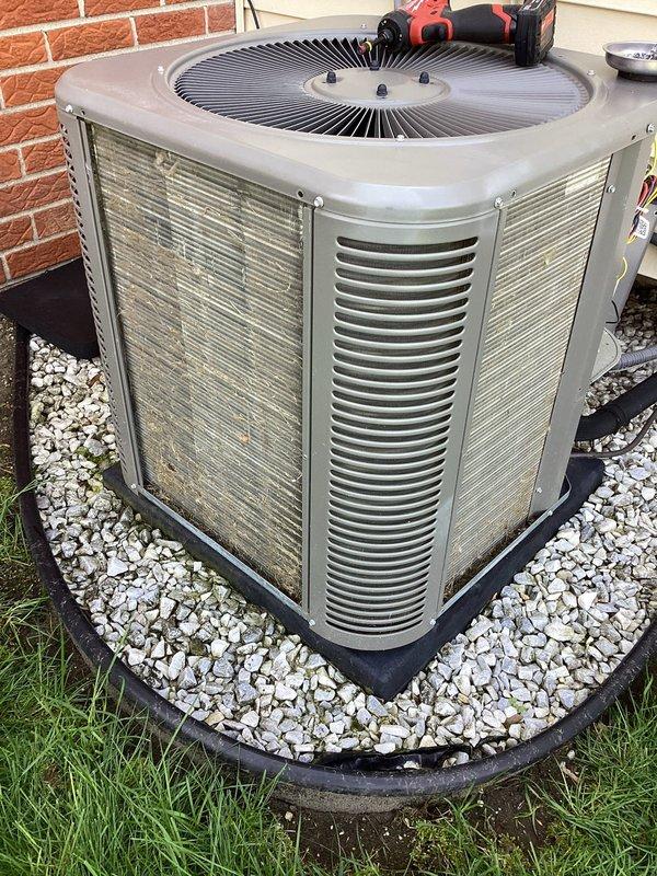 Completed annual Air Care Maintenance on residential outdoor condensing unit. Performed comprehensive system inspection, verified proper operation of compressor and condenser fan motor, checked refrigerant lines and electrical connections, and confirmed unit functionality. Equipment found in good operating condition with adequate airflow through coil louvers and proper drainage around gravel pad base.