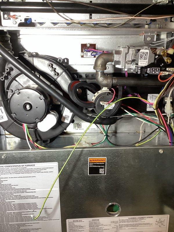 Completed annual heating and cooling maintenance on residential HVAC system. Performed comprehensive inspection of furnace components including gas valve, blower motor assembly, heat exchanger, and electrical connections. Inspected evaporator coil and noted mineral buildup and contamination on evaporator cooler pad, indicating need for replacement during next service. Verified all wiring connections secure, checked condensate drain system operation, and confirmed proper airflow through unit. All system components operating within manufacturer specifications at time of inspection.