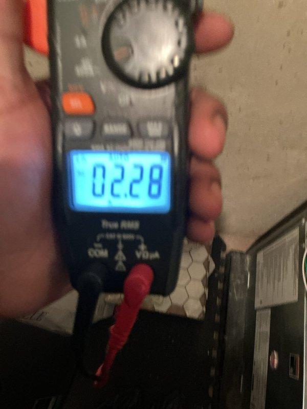 Completed annual cooling maintenance on two residential zones. Performed comprehensive system inspections including electrical testing with multimeter showing proper amp draw at 0.228A. Inspected outdoor condenser unit, verified fan operation, and checked coil condition through protective grille. Both systems operating within normal parameters with no immediate service needs identified.