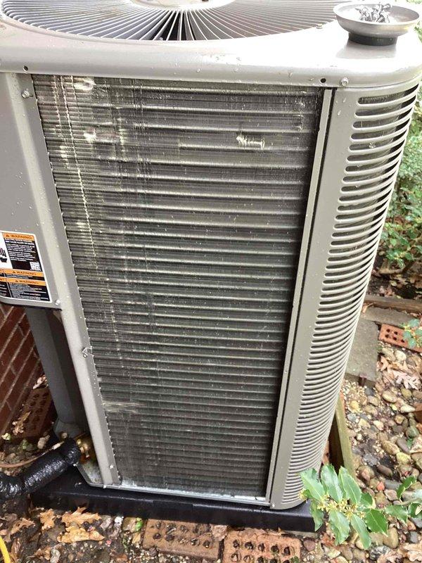 Performed comprehensive Air Care Maintenance on HVAC system including both heating and cooling components. Condenser unit exhibited heavy accumulation of dirt, dust, and debris on exterior coils and fins, which was thoroughly cleaned to restore optimal airflow and heat transfer efficiency. Cleared organic debris, leaves, and dirt from around unit base and surrounding area to prevent future blockage and ensure proper drainage. Inspected all accessible components, verified proper operation of condenser fan assembly, and confirmed system functionality upon completion of maintenance service.