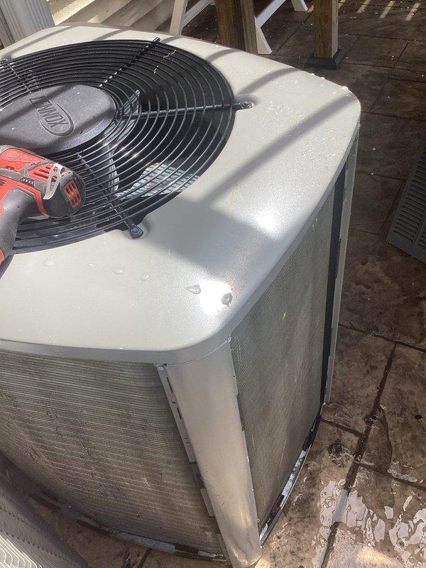 Completed comprehensive 5-year ComfortGuard maintenance service on outdoor condensing unit. Performed thorough inspection of all system components including condenser coils, fan assembly, and electrical connections. Condenser coils showed moderate accumulation of dirt and debris between fins, which was addressed during service. Cleaned and serviced unit exterior panels showing weather-related wear and discoloration. Verified proper operation of condenser fan and motor assembly protected by fan guard. All mechanical fasteners checked and secured as needed. Unit restored to optimal operating condition and ready for continued service.