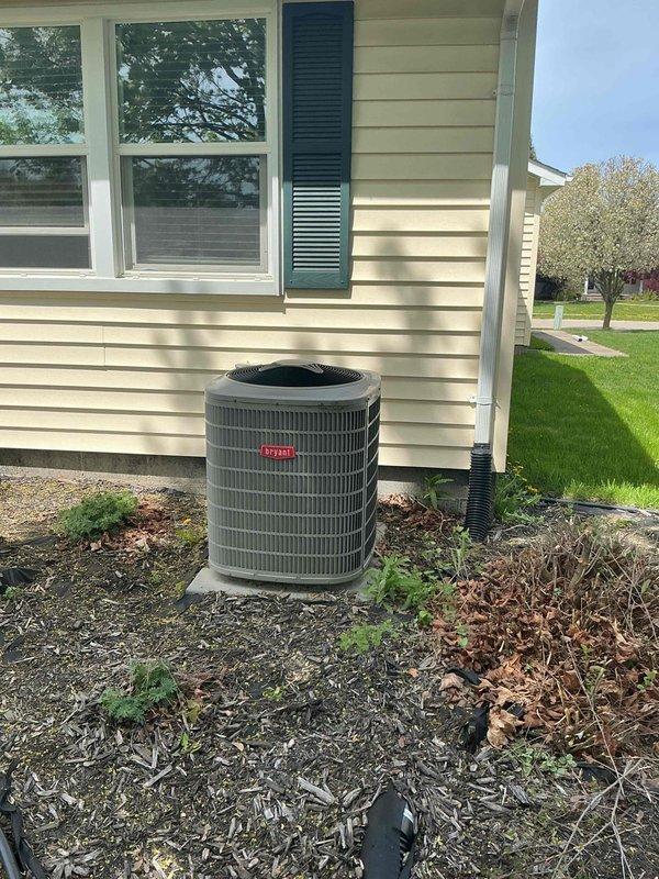 Completed full system estimate for 1,400 square foot residential property with 16-year-old HVAC equipment experiencing multiple failure points. Air conditioning unit presenting with significant water drainage issues inside ductwork, along with numerous failing components requiring replacement. Furnace showing advanced age deterioration with visible rust on internal parts. Assessed outdated humidifier system attached to furnace, determined need for replacement with modern, energy-efficient unit. Evaluated exterior condensing unit positioned on concrete pad with proper clearances. Documented current system configuration including tankless water heater installation. Provided comprehensive replacement recommendations for complete HVAC system upgrade to address immediate moisture concerns, equipment reliability issues, and improved operational efficiency for the home.