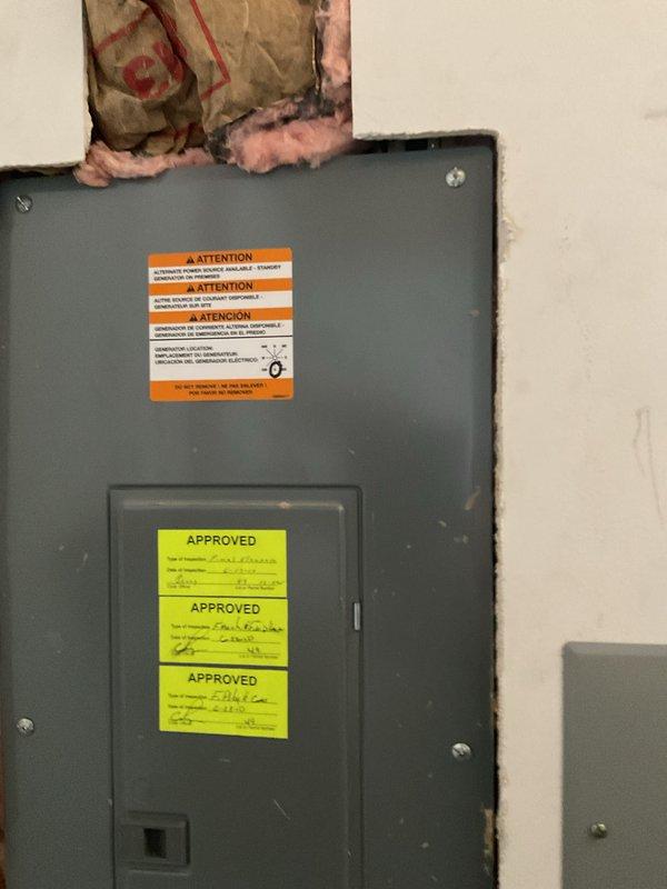 Successfully installed a 20kW 200-amp automatic transfer switch generator system, including all necessary electrical connections, transfer switch integration, gas piping, and pressure testing. All required permits were obtained for mechanical, electrical, generator, gas pipe, pressure test, and transfer switch components. The installation included mounting exterior electrical components with proper conduit routing along the building's brick exterior, and installing the automatic transfer switch panel in the interior utility space with appropriate safety labeling and inspection approvals.