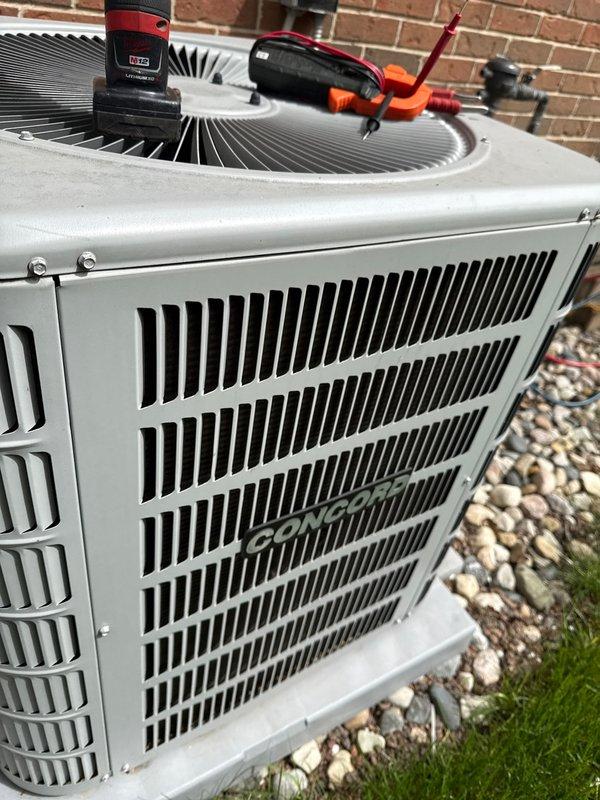 Completed annual cooling maintenance on Goodman outdoor condensing unit. Performed comprehensive system inspection, tested electrical components with multimeter, and verified proper operation of compressor and condenser fan. Unit operating within normal parameters with no issues identified.