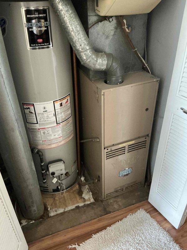 Provided comprehensive estimate for replacement of 30+ year old furnace and air conditioning system located on main level. Current natural gas furnace and AC unit are operational but have exceeded their expected service life. Assessed existing equipment configuration, electrical panel capacity, ductwork connections, and utility closet installation space to determine replacement specifications and compatibility requirements.