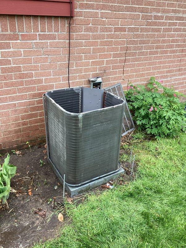 Completed annual cooling maintenance on residential split system. Performed comprehensive inspection of outdoor condensing unit, which showed significant dirt and debris accumulation on exterior surfaces. Cleaned condenser coil, checked electrical connections at disconnect box, verified proper operation of all components, and ensured adequate clearance around unit. System operating within normal parameters upon completion of maintenance service.