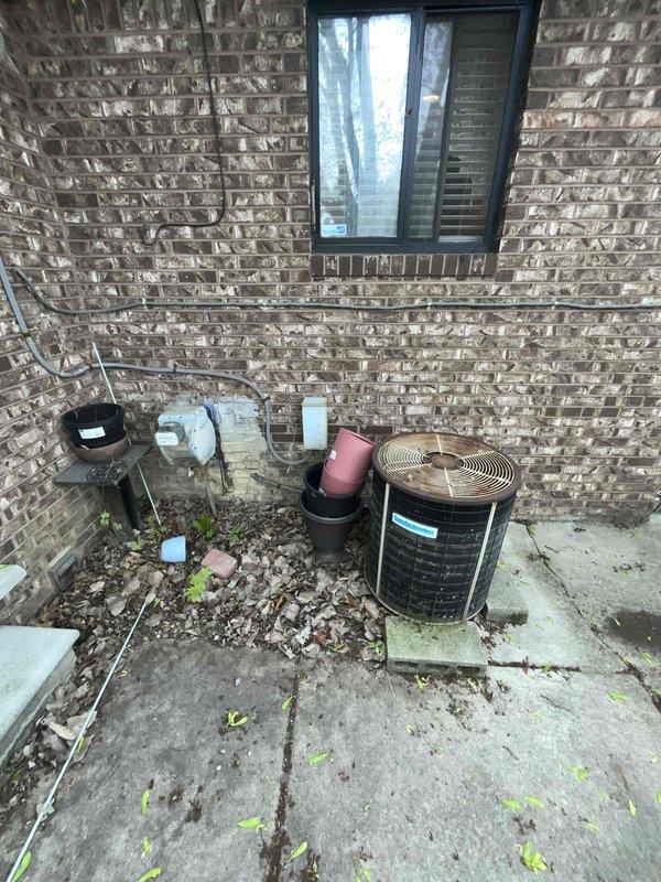 Completed comprehensive assessment for replacement estimate of 45-year-old air conditioning and natural gas furnace system currently located in kitchen area with crawl space access. Evaluated existing outdoor condenser unit and indoor equipment configuration to provide BOGO replacement proposal for both heating and cooling systems. Documented current equipment condition, installation location constraints, and access points to determine appropriate replacement specifications and installation requirements.