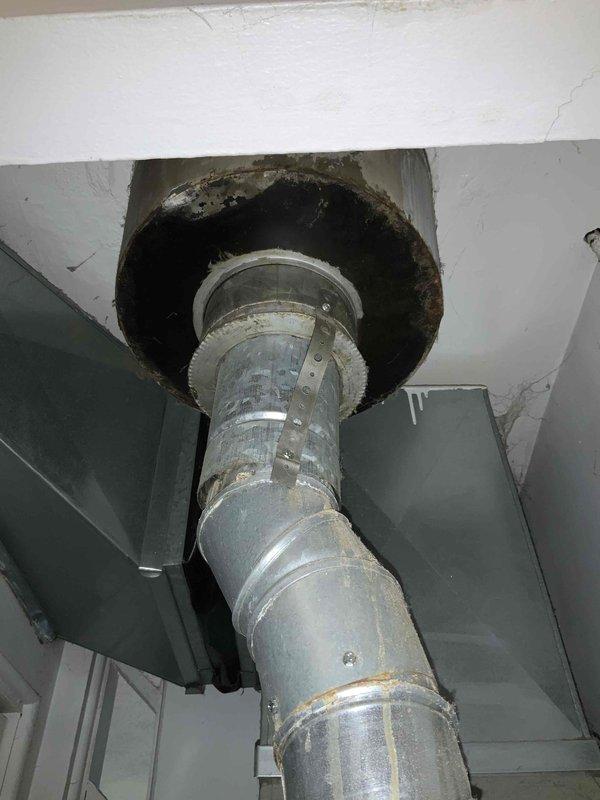 Conducted comprehensive site assessment for air conditioning system replacement on 950 square foot residential property. Evaluated existing ductwork infrastructure and confirmed adequate condition for new equipment installation, with furnace system requiring no replacement. Assessed electrical panel capacity and verified proper sizing requirements for 1.5 to 2-ton AC unit installation. Documented existing ventilation ductwork showing age-related wear and ceiling penetration with moisture staining indicators. Prepared full system estimate for AC installation utilizing existing duct infrastructure.
