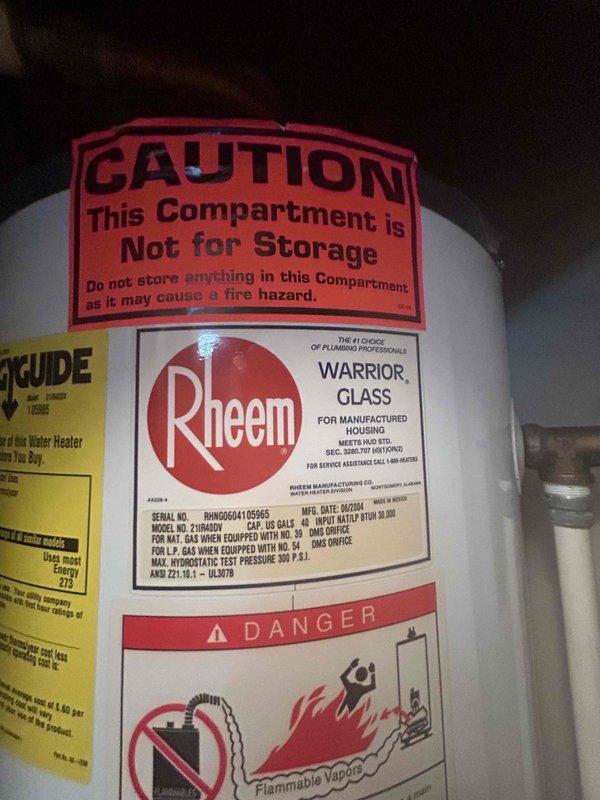 Completed water heater estimate for mobile home installation. Inspected existing Rheem model 21HA02V gas water heater unit located in closet compartment, documented current equipment specifications including serial number and model information, photographed installation area including supply connections with flexible copper corrugated tubing and brass fittings, and assessed replacement requirements for non-operational unit.