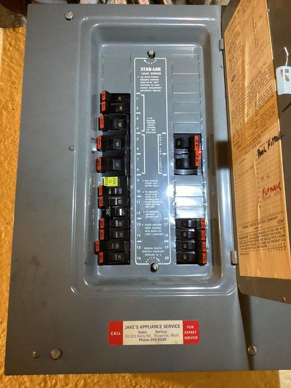 Conducted comprehensive electrical panel upgrade estimate for existing Stab-Lok dual cover panel installation. Documented current panel configuration, breaker arrangement, and accessibility conditions in unfinished basement utility area. Assessed replacement requirements due to known safety concerns associated with Stab-Lok breaker systems and provided recommendations for modern circuit breaker panel upgrade to meet current electrical code standards.