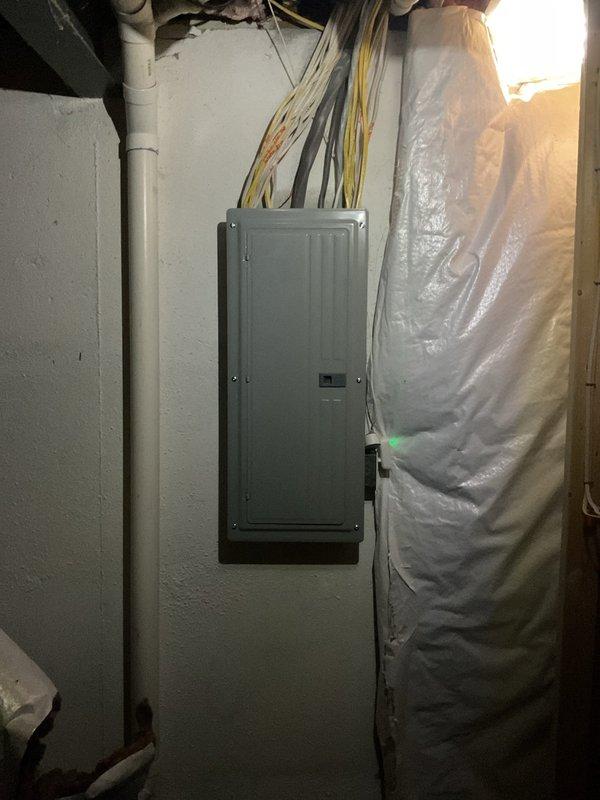 Completed comprehensive whole home electrical inspection on 22-year-old residential property. Performed thorough evaluation of main electrical panel, verifying proper circuit breaker operation, labeling accuracy, and panel condition. Inspected all visible wiring connections, including service entrance conductors and branch circuit cables. Verified proper installation of electrical components in basement utility area, examined wire routing from panel to distribution points, and assessed condition of electrical infrastructure throughout accessible areas. Documented panel configuration showing proper circuit identification for all breakers serving major appliances, lighting circuits, and general receptacles. Confirmed electrical system compliance with current safety standards. All circuits functioning properly with no deficiencies identified during inspection. Photographed panel interior and surrounding installation for service records.