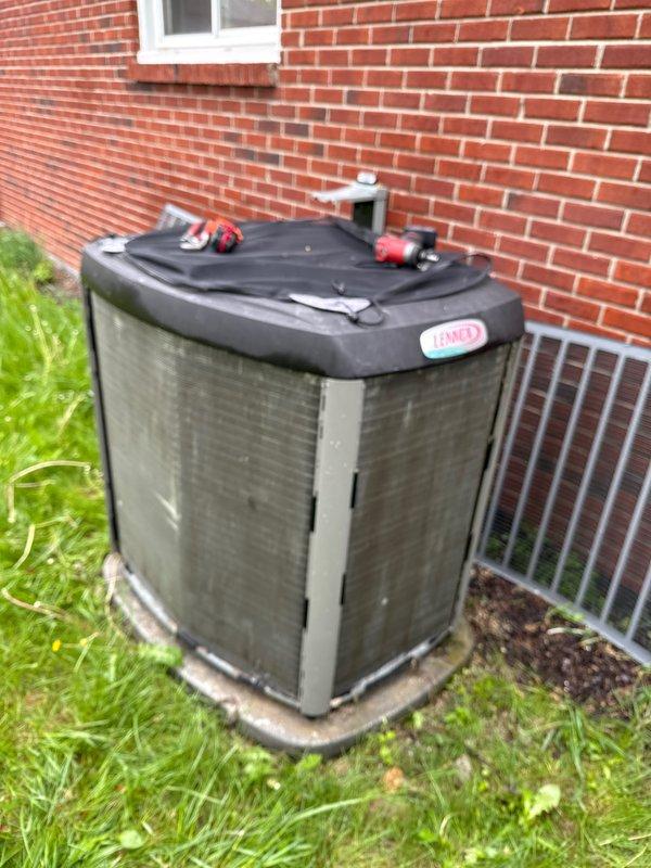 Completed annual cooling maintenance on residential Lennox condensing unit. Performed comprehensive inspection of outdoor unit including cleaning condenser coils, checking refrigerant levels, testing electrical connections, and verifying proper system operation. Unit found in satisfactory working condition with all components functioning within normal parameters.