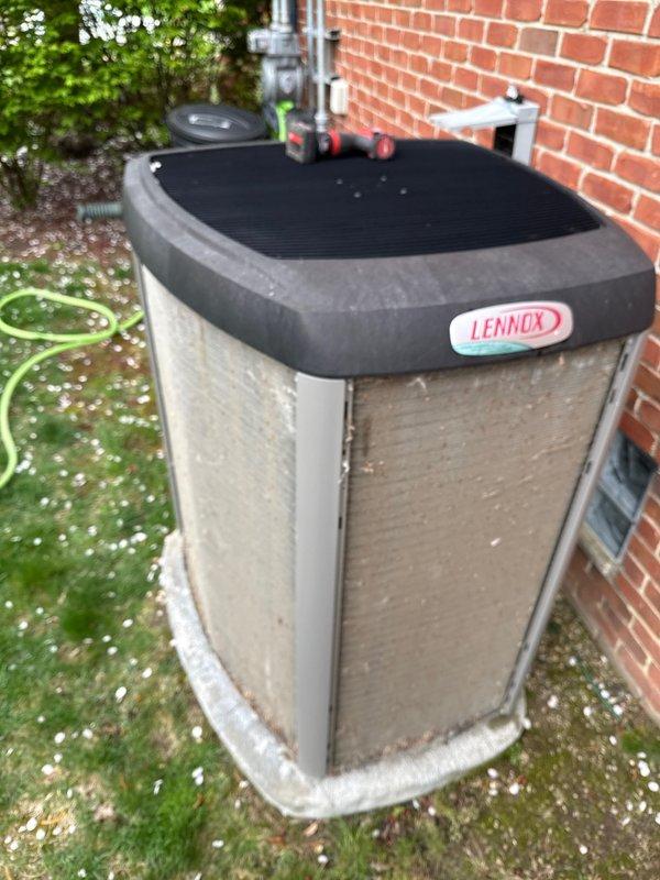 Completed routine preventative maintenance on two Lennox air conditioning condensers as part of ongoing recurring service agreement. Performed standard ACM procedures including inspection of refrigerant lines, electrical connections, and condenser coil conditions. Both units operational with no immediate service concerns identified. Exterior panels showed normal weathering and environmental accumulation consistent with outdoor installation age. Documented equipment condition through photographic records for maintenance history tracking.