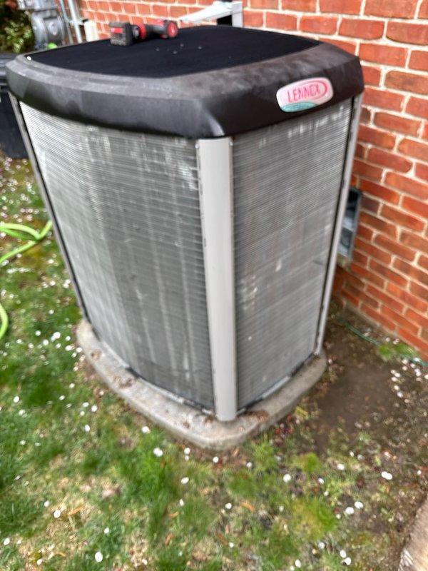 Completed routine preventative maintenance on two Lennox air conditioning condensers as part of ongoing recurring service agreement. Performed standard ACM procedures including inspection of refrigerant lines, electrical connections, and condenser coil conditions. Both units operational with no immediate service concerns identified. Exterior panels showed normal weathering and environmental accumulation consistent with outdoor installation age. Documented equipment condition through photographic records for maintenance history tracking.