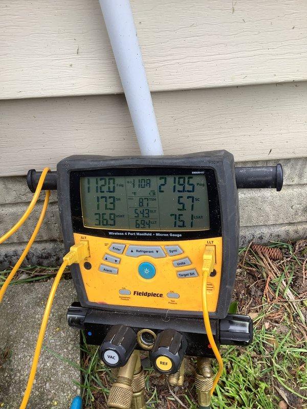 Responded to no cooling complaint on recently installed air conditioning system. Upon arrival, found unit running but delivering insufficient cooling capacity. Connected wireless manifold gauges to measure system pressures and temperatures. Diagnostic readings revealed abnormal operating pressures inconsistent with proper refrigerant charge levels. Performed comprehensive system evaluation including superheat and subcooling measurements using digital manifold with micron gauge capability. Identified refrigerant undercharge as primary cause of inadequate cooling performance. System pressures indicated low refrigerant levels preventing proper heat transfer at condenser coil. Added refrigerant to manufacturer specifications and verified proper charge through temperature and pressure analysis. Confirmed all service port connections sealed properly after charging procedure. Cycled system through complete cooling cycle to verify restoration of normal operating parameters and adequate cooling