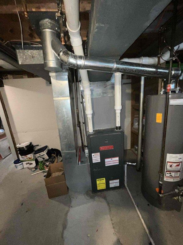 Conducted on-site assessment for 3.5 ton air conditioning system replacement in 2400 square foot single family residence. Inspected existing HVAC equipment located in basement mechanical room, documented current furnace and ductwork configuration, photographed equipment specifications and system layout to provide accurate replacement estimate for homeowner comparing multiple contractor quotes.