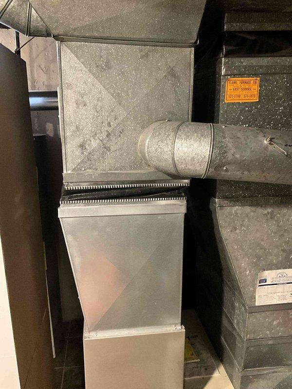 Conducted on-site evaluation of an 18-year-old residential air conditioning system experiencing refrigerant leaks and operational failure. Inspected outdoor condenser unit, indoor air handler, ductwork connections, and assessed overall system condition to provide replacement estimate. Documented existing equipment specifications and installation configuration with photographs for proposal development.