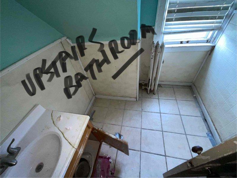 Provided estimate for complete HVAC system conversion from existing heating system to forced air in residential property. Assessed basement utility area containing aging water heater and deteriorating boiler unit with significant corrosion on piping, standing water on floor, and overall equipment wear indicating end of service life. Recommended full forced air system installation including new furnace, ductwork distribution throughout home, and proper drainage solutions to address moisture issues in mechanical room.