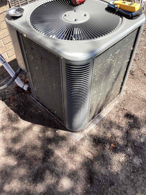 Completed routine maintenance on two outdoor air conditioning condenser units. Performed visual inspection of both units, noting accumulated dirt and weathering on exterior casings and surfaces. Inspected fan assemblies, motor components, refrigerant lines, and electrical connections for proper operation and condition. Both units operational at time of service completion.
