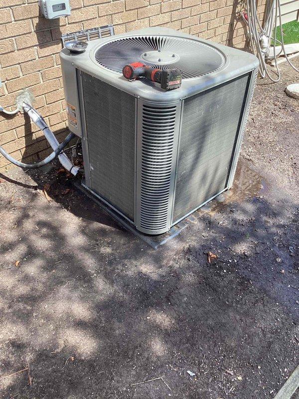 Completed routine maintenance on two outdoor air conditioning condenser units. Performed visual inspection of both units, noting accumulated dirt and weathering on exterior casings and surfaces. Inspected fan assemblies, motor components, refrigerant lines, and electrical connections for proper operation and condition. Both units operational at time of service completion.