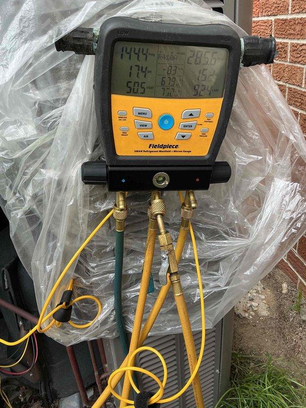 Completed comprehensive AC tune-up on 11-year-old Lennox central air conditioning system. Performed full system diagnostics using digital manifold gauges to verify refrigerant pressures and temperatures, confirmed proper superheat and subcooling values, and inspected condenser unit including coil condition and electrical components. Assisted with new thermostat setup and programming, activated cooling system for the season, and verified all equipment operating within manufacturer specifications with no issues found.
