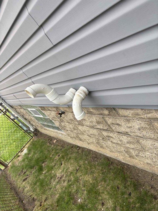 Provided comprehensive estimate for furnace and air conditioning replacement in basement location. Existing 2003 system non-operational due to failed heat exchanger, requiring complete unit replacement. Evaluated electrical panel configuration, existing ductwork connections, and exterior condensate drainage system to determine proper equipment specifications and installation requirements for new HVAC system.