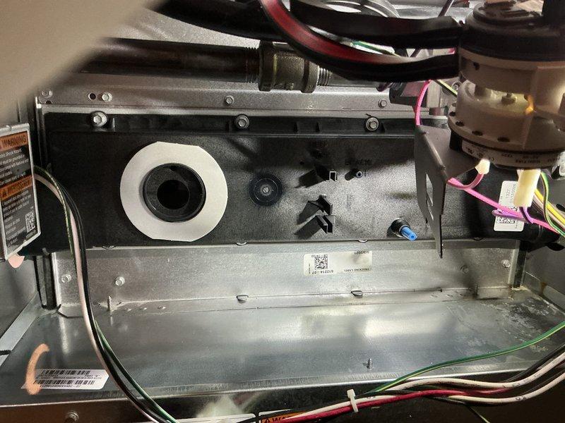 Responded to a warranty service call for HVAC system requiring collector box replacement. Accessed the furnace blower assembly and identified the failed collector box component (part #17F26). Ordered replacement part from Lennox supply house under full warranty coverage and scheduled follow-up visit to complete the installation of the new collector box assembly.