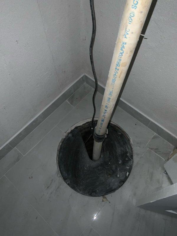 Conducted on-site assessment for standard water heater replacement in residential utility room. Evaluated existing functional water heater installation, including connected copper supply lines, PVC drain piping, pressure relief valve configuration, and proximity to water softener system. Documented current equipment specifications, plumbing connections, and surrounding utility infrastructure to prepare accurate replacement estimate for standard tank-type water heater unit.