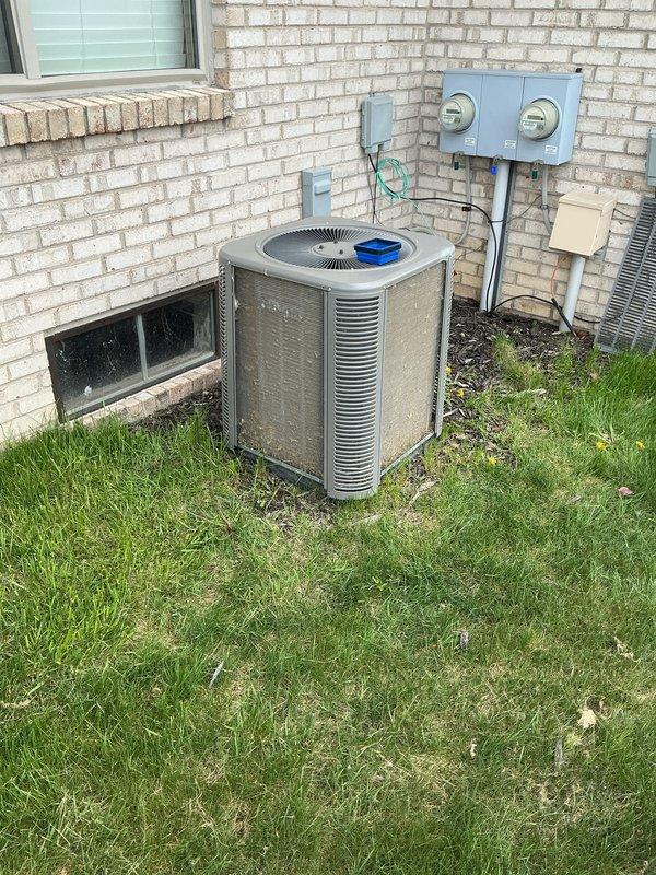 Completed annual cooling maintenance on residential air conditioning system. Performed comprehensive inspection of outdoor condenser unit, verified proper operation of compressor and condenser fan motor, checked refrigerant levels, and cleaned condenser coils. Inspected electrical connections at disconnect box and confirmed secure mounting of all components. Unit operating within normal parameters with no issues identified.