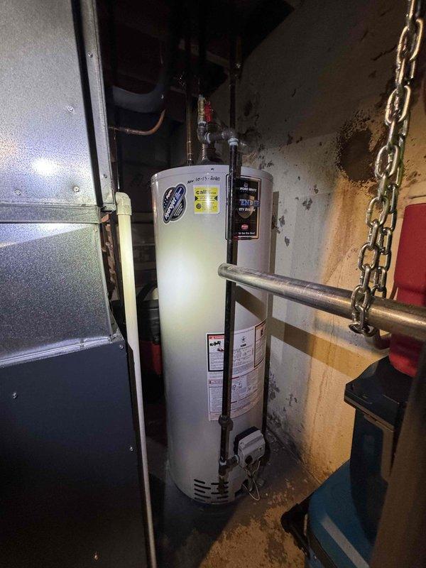 Conducted comprehensive evaluation of existing 16-year-old Goodman HVAC system in basement mechanical room to provide full system replacement estimate. Assessed current furnace, ductwork configuration, and venting requirements, documenting equipment condition and installation layout with detailed photographs. Customer requested immediate replacement options rather than investing in repairs to aging equipment, requiring analysis of system specifications and replacement recommendations for new HVAC installation.