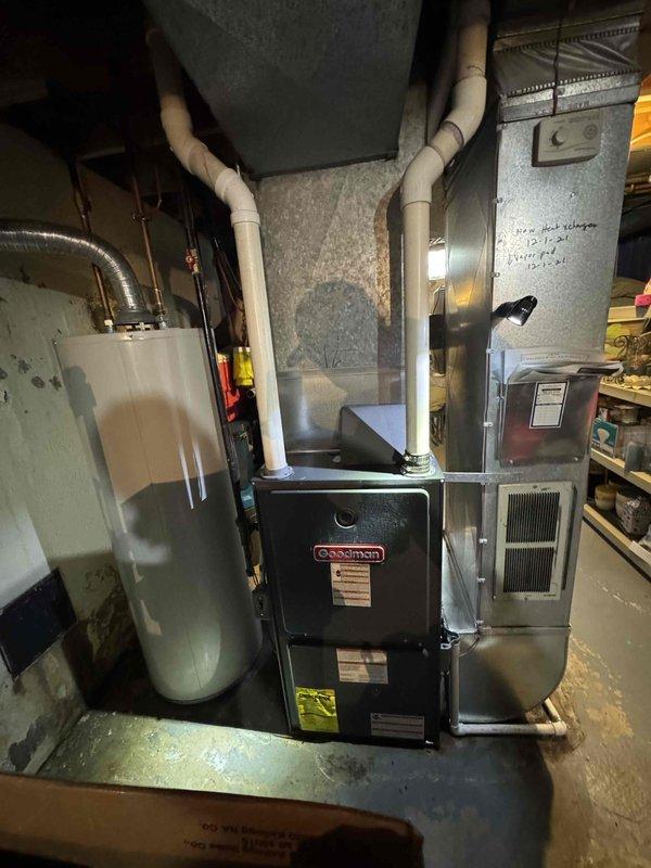 Conducted comprehensive evaluation of existing 16-year-old Goodman HVAC system in basement mechanical room to provide full system replacement estimate. Assessed current furnace, ductwork configuration, and venting requirements, documenting equipment condition and installation layout with detailed photographs. Customer requested immediate replacement options rather than investing in repairs to aging equipment, requiring analysis of system specifications and replacement recommendations for new HVAC installation.