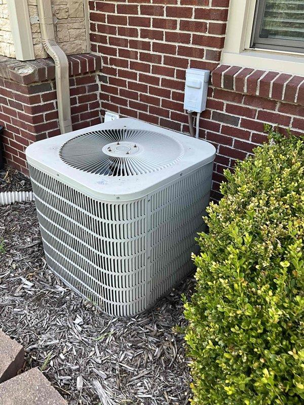 Completed commercial HVAC system installation including outdoor condenser unit and indoor ductwork components. Installed new condenser unit on concrete pad with proper electrical disconnect and line set connections. Configured basement ductwork system with metallic supply lines and secured all connections with appropriate clamps and fasteners. System tested and operational upon completion, with all components functioning per manufacturer specifications.