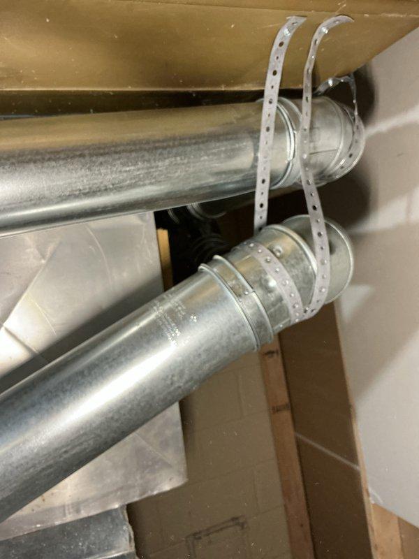 Completed full installation of 3-ton air conditioning system with matching evaporator coil. Installed outdoor condensing unit in side yard area with proper electrical disconnect and conduit routing, secured new metallic supply ductwork to structural framing using perforated metal straps in attic space, and reconnected all refrigerant lines and electrical connections. All mechanical and electrical permits were obtained prior to installation, system was tested for proper operation, and DTE energy rebate documentation was processed.