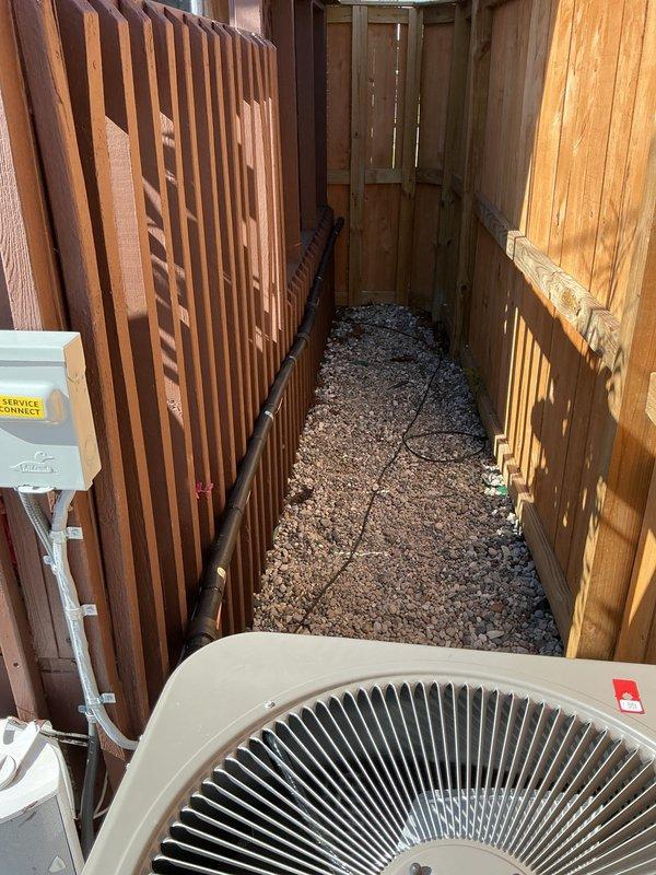 Completed full installation of 3-ton air conditioning system with matching evaporator coil. Installed outdoor condensing unit in side yard area with proper electrical disconnect and conduit routing, secured new metallic supply ductwork to structural framing using perforated metal straps in attic space, and reconnected all refrigerant lines and electrical connections. All mechanical and electrical permits were obtained prior to installation, system was tested for proper operation, and DTE energy rebate documentation was processed.