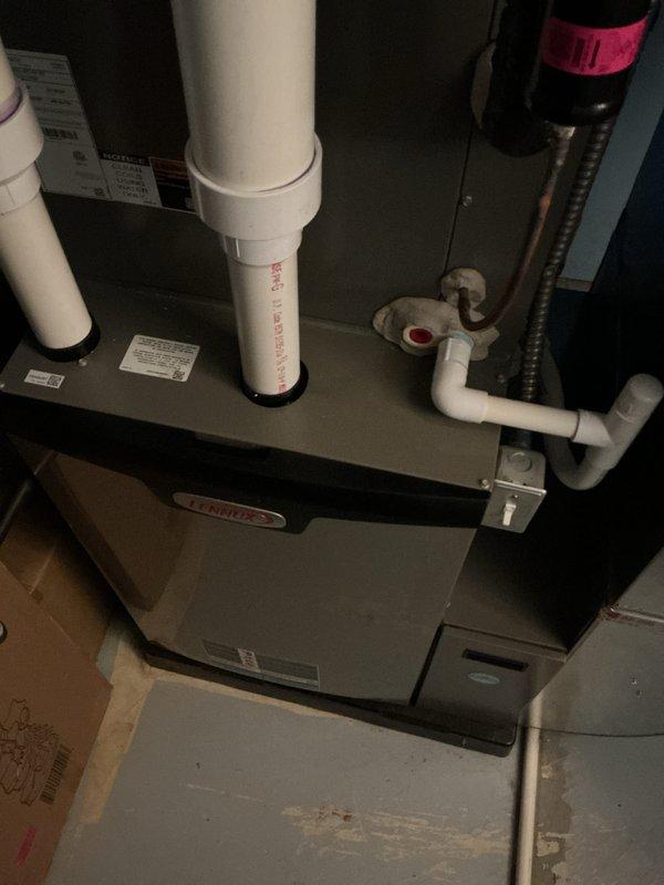 Completed annual heating maintenance tune-up on residential furnace system as part of active air care membership. Performed comprehensive inspection of all HVAC components including blower motor assembly, electrical connections, condensate drainage system, and PVC venting. All systems inspected, tested, and verified operational with no deficiencies noted; unit operating within manufacturer specifications.